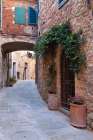 Italy-Tuscany Street scene in the medieval village of Lucignano Art Print